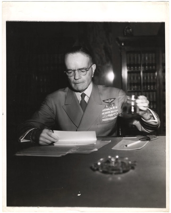 Naval Officer in a meeting