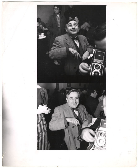 Man laughing in cafe