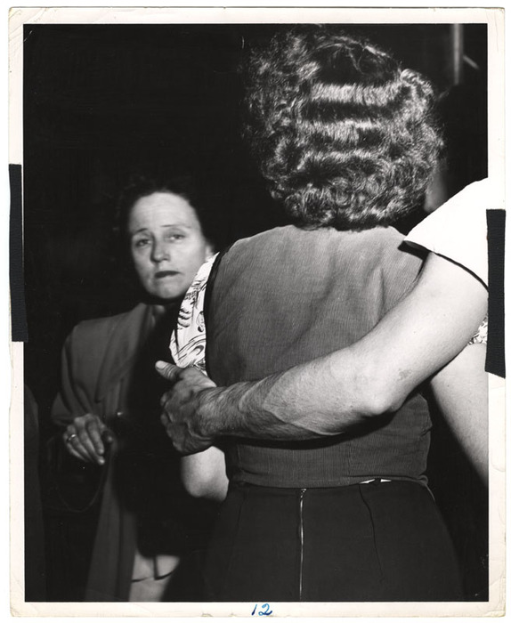Woman with arm around her