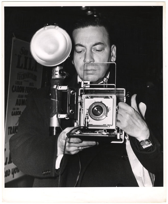 Press photographer with camera