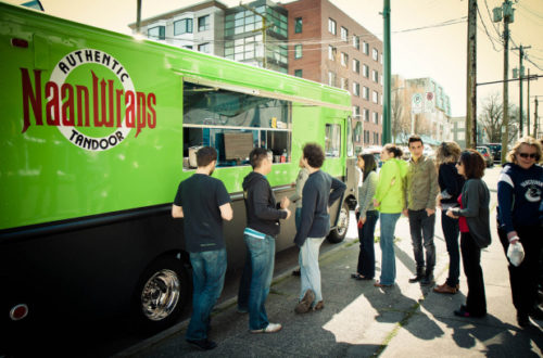 This Vancouver food truck serves a long line of people. Vancouver is one of the cities Saskatoon has looked at when building it's food truck policy.