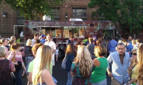 PHOTO BY JILL WENDHOLT SILVA Hungry street diners gather at The Star’s Food Truck Friday.