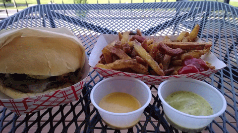 TALL ORDER Burgers, fries, and aoilis at Mainely Burgers