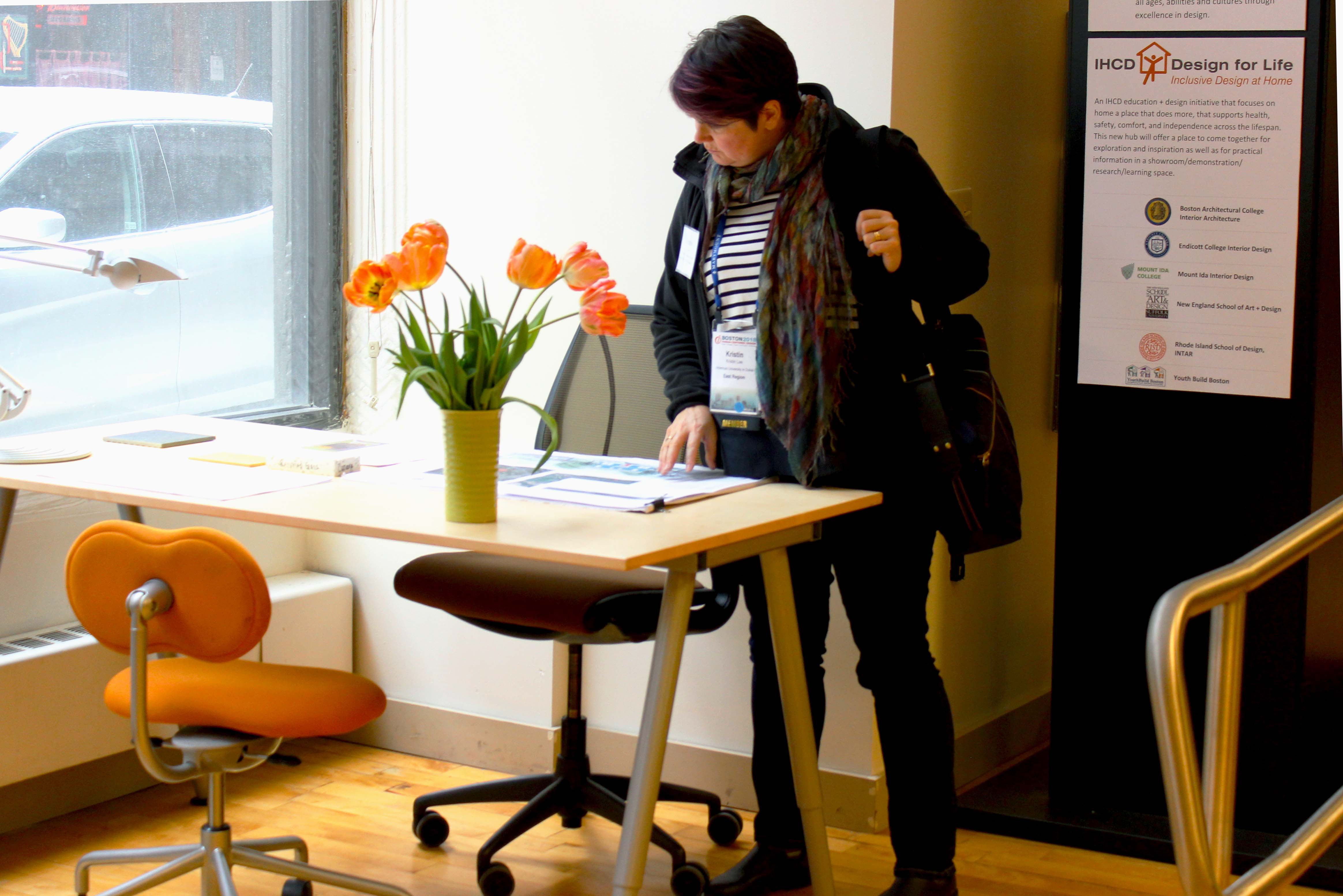 a woman reading about inclusive design in the home