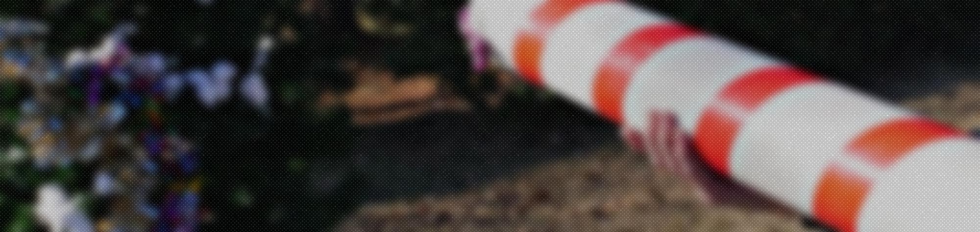 Decorating a Christmas Tree with a Candy Cane Cannon