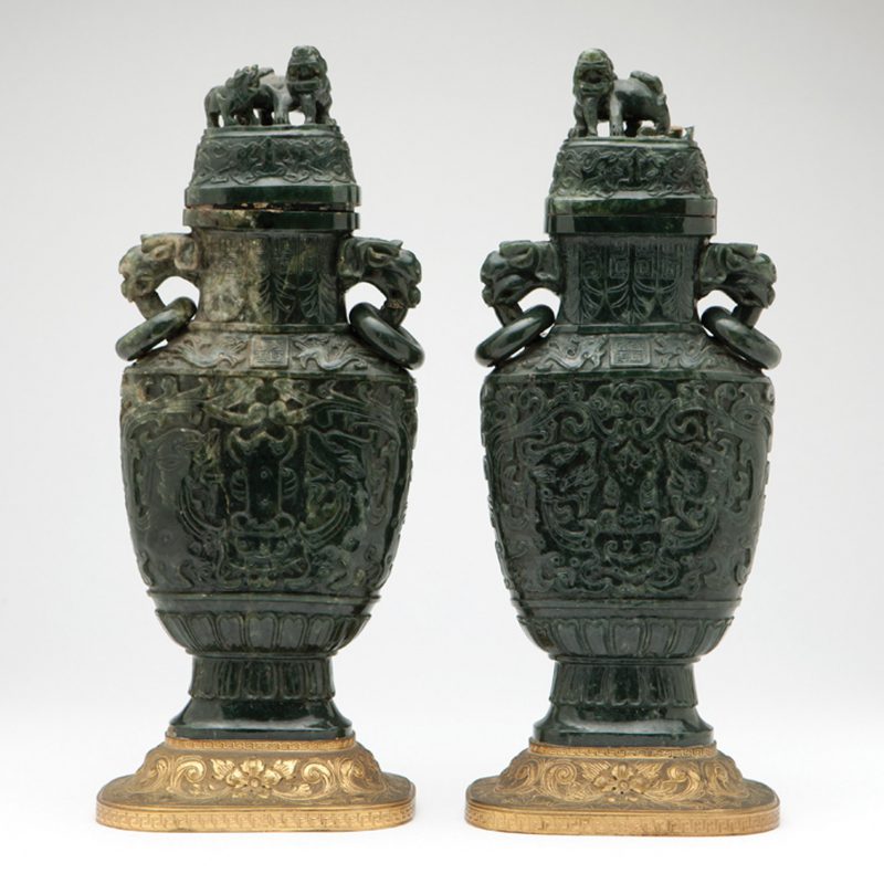 Pair of Chinese carved spinach jade covered urns, Price Realized $54,000