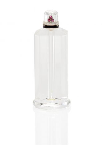 A French Cartier Art Deco Rock Crystal And Gem-Set Perfume Bottle, price realized: $21,250
