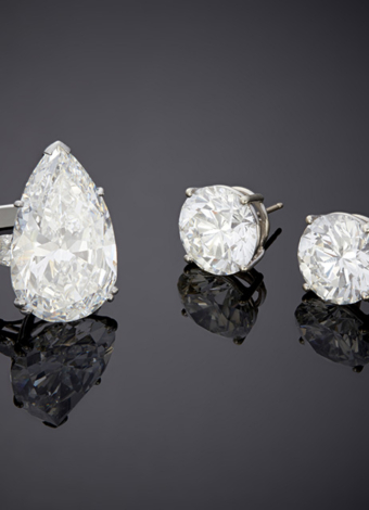 A pear-shaped diamond ring and a pair of diamond stud earrings. $400,000-500,00 and $200,000-300,000
