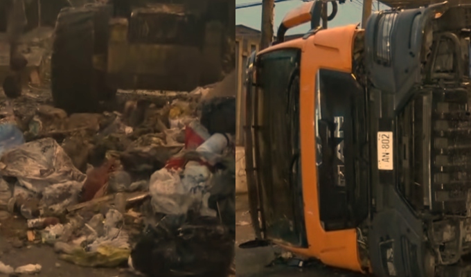 SJM: camión de basura choca contra muro y queda volcado tras intensa llovizna