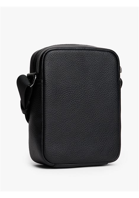 Borsa reporter con tracolla e logo in metallo Nero TOMMY HILFIGER | AM0AM13632BDS