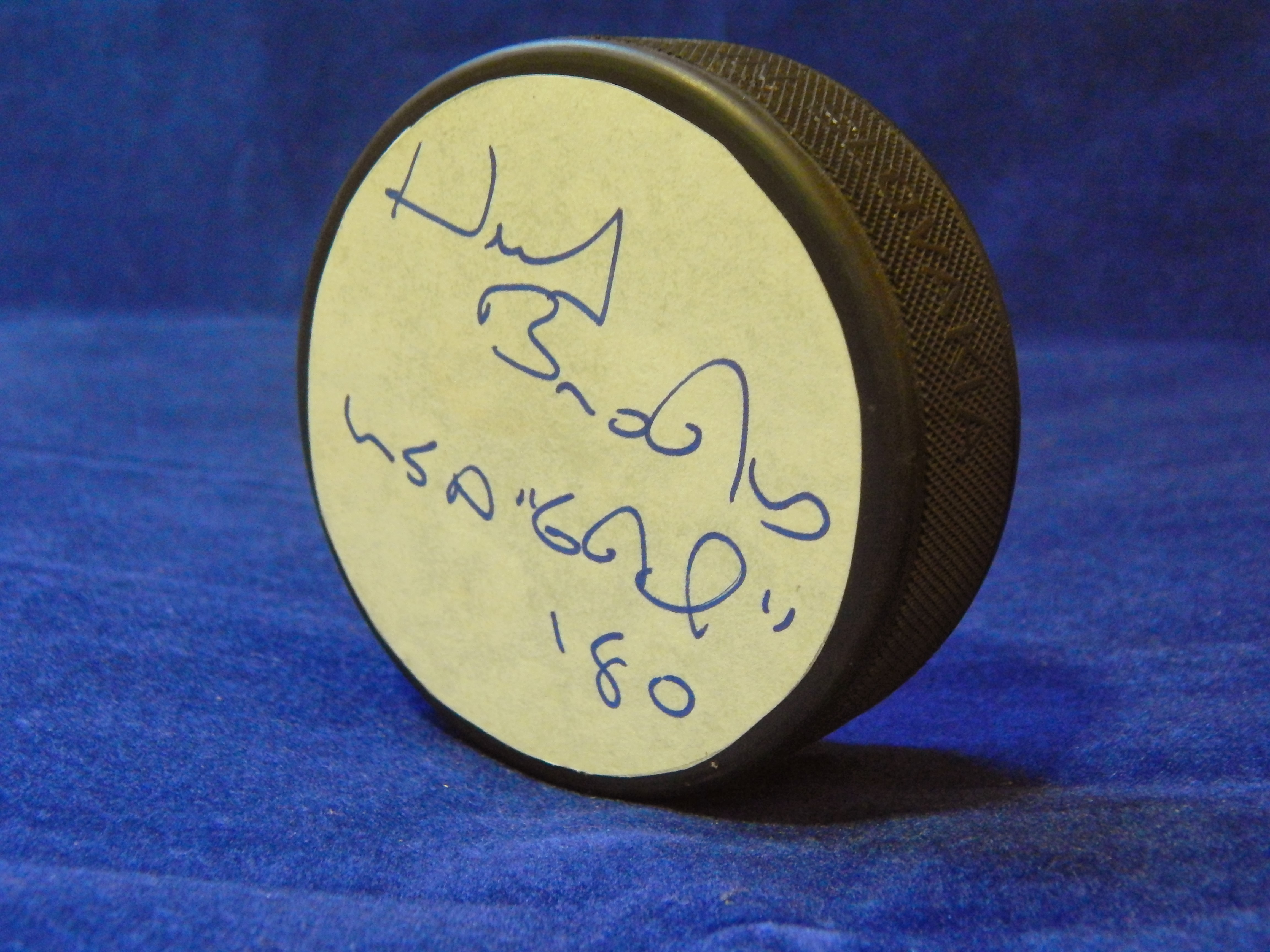 Charitybuzz Herb Brooks Autographed Hockey Puck Lot 495200