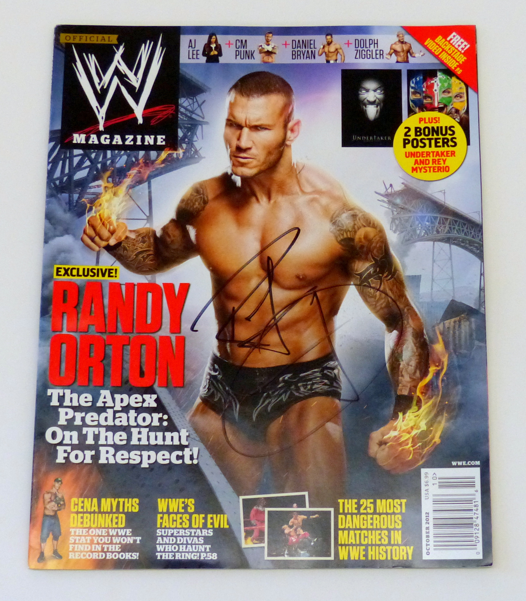 Charitybuzz Collect a WWE Magazine from October 2012 Featuring and Si