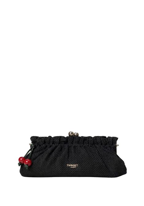 Borsa clutch in rafia con charm ciliegie