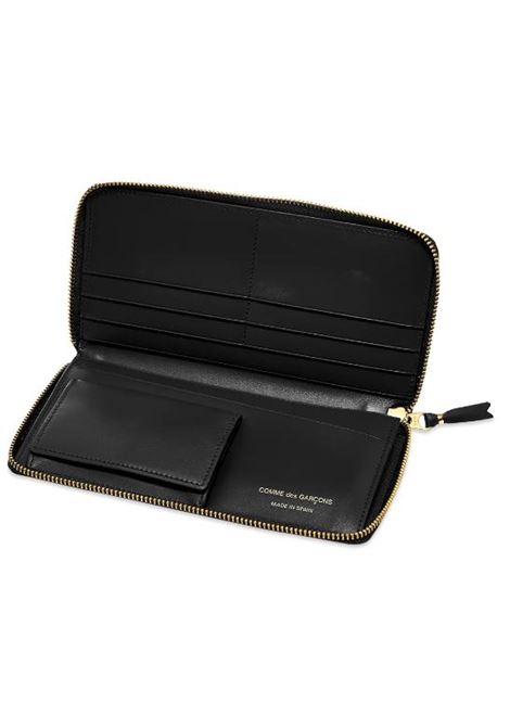 comme des garçons meaning zip code