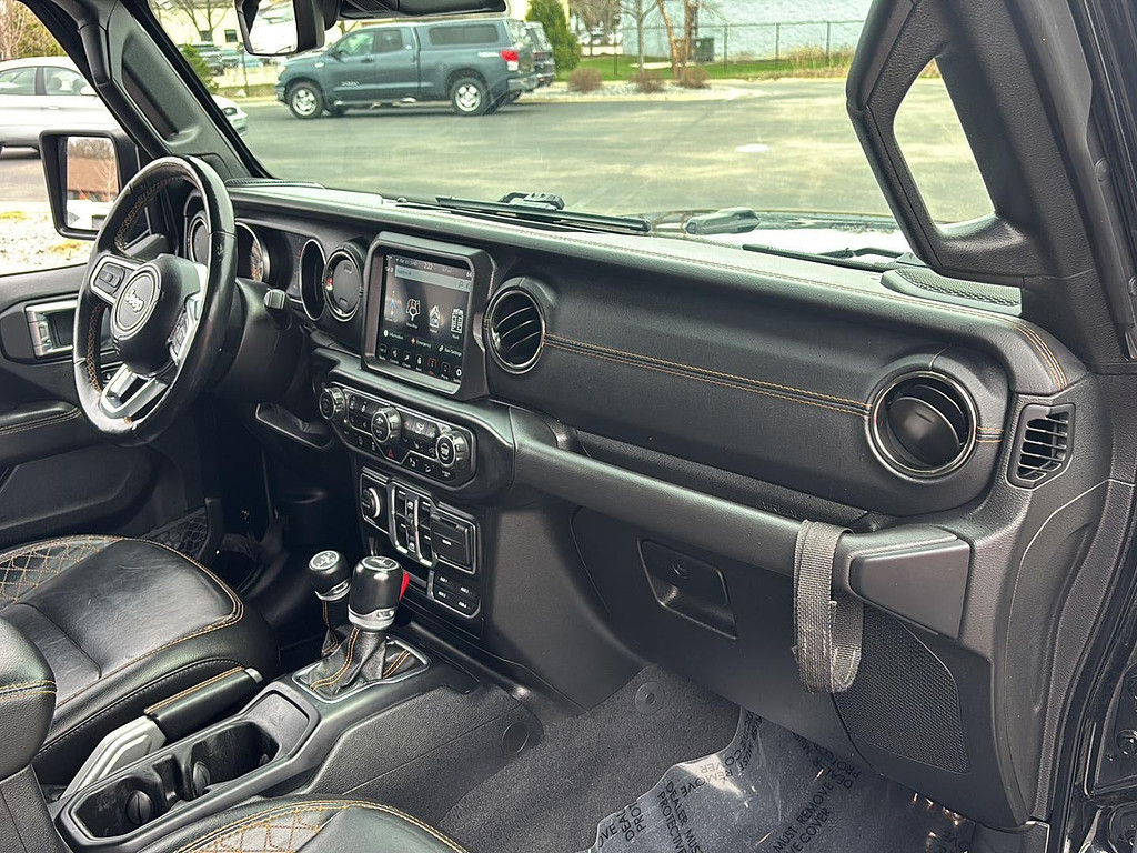 2021 Jeep Wrangler Located at Smart Motors Toyota light-box-slides