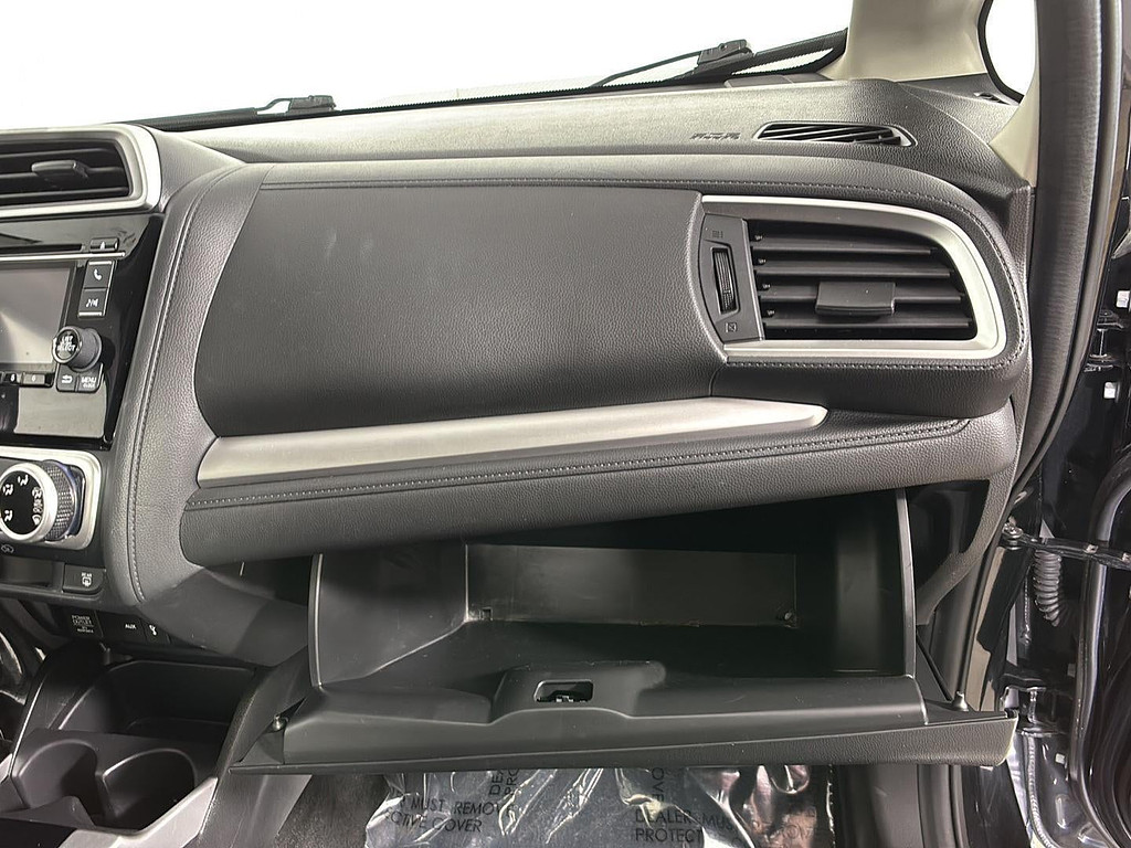 2016 Honda Fit Located at Smart Motors Toyota light-box-slides