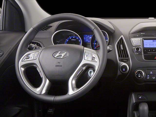 2012 Hyundai Tucson Located at Smart Motors Toyota slide-image