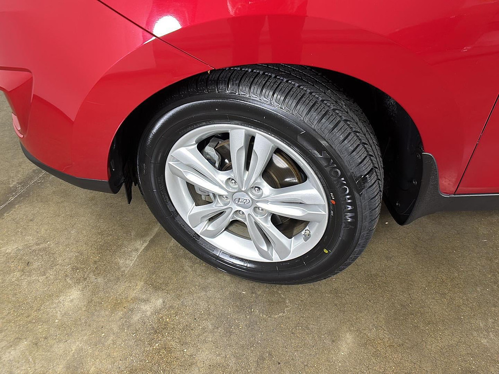 2012 Hyundai Tucson Located at Smart Motors Toyota slide-image