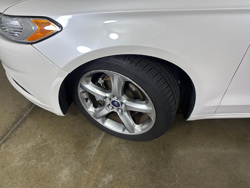 2015 Ford Fusion Located at Smart Motors Toyota slide-image