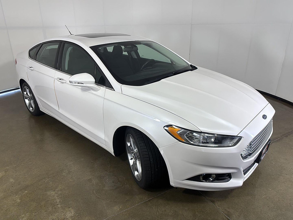 2015 Ford Fusion Located at Smart Motors Toyota slide-image