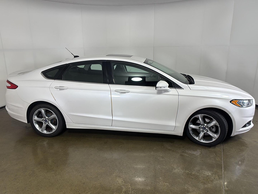 2015 Ford Fusion Located at Smart Motors Toyota slide-image