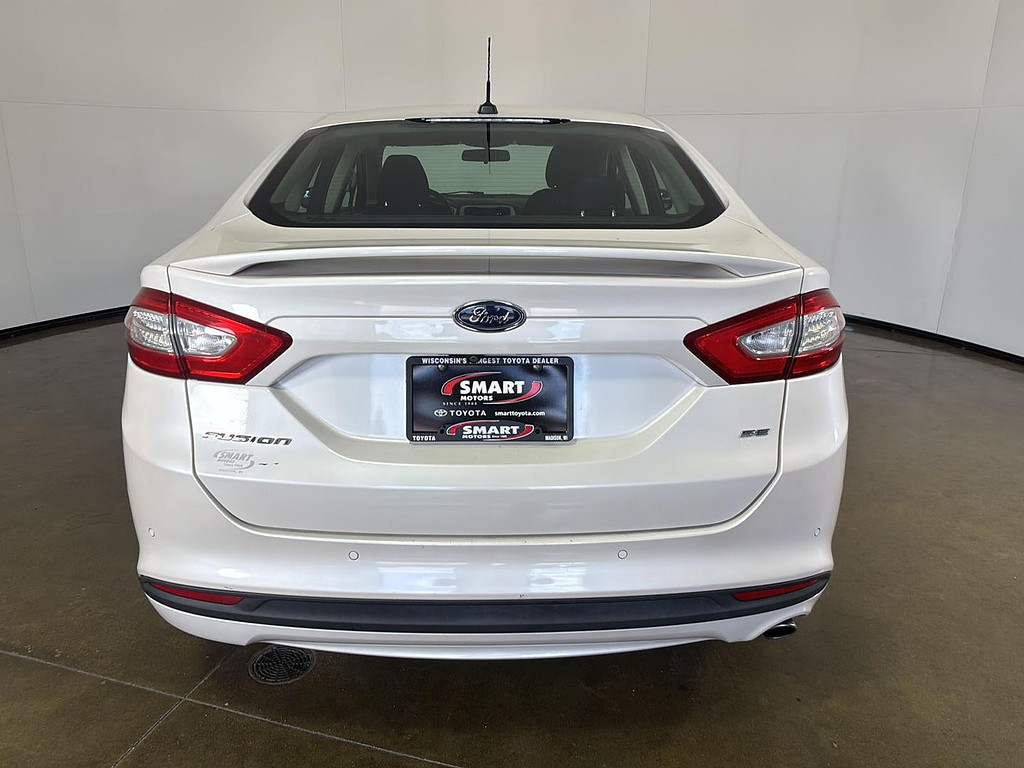 2015 Ford Fusion Located at Smart Motors Toyota slide-image