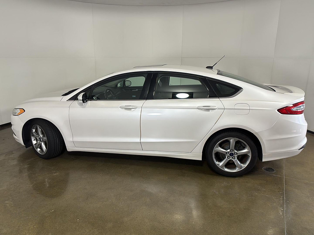 2015 Ford Fusion Located at Smart Motors Toyota slide-image
