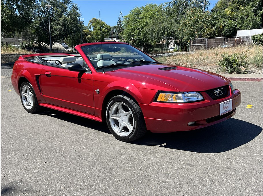 1999 Ford Mustang Located at Hayes Autos Classic slide-image
