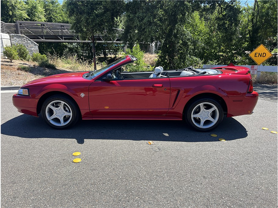 1999 Ford Mustang Located at Hayes Autos Classic slide-image