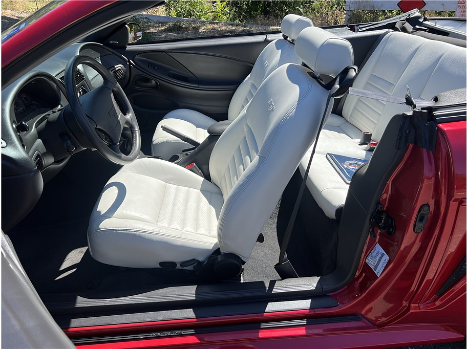 1999 Ford Mustang Located at Hayes Autos Classic slide-image