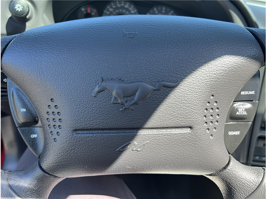 1999 Ford Mustang Located at Hayes Autos Classic slide-image