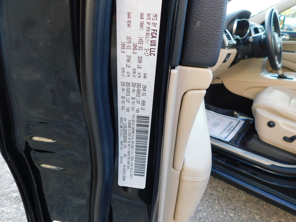 2017 Jeep GRAND CHEROKEE Located at All American Motors light-box-slides