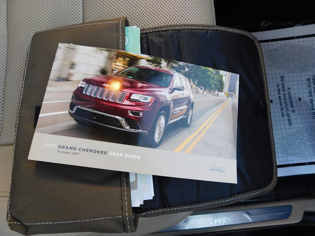 2017 Jeep GRAND CHEROKEE Located at All American Motors light-box-slides