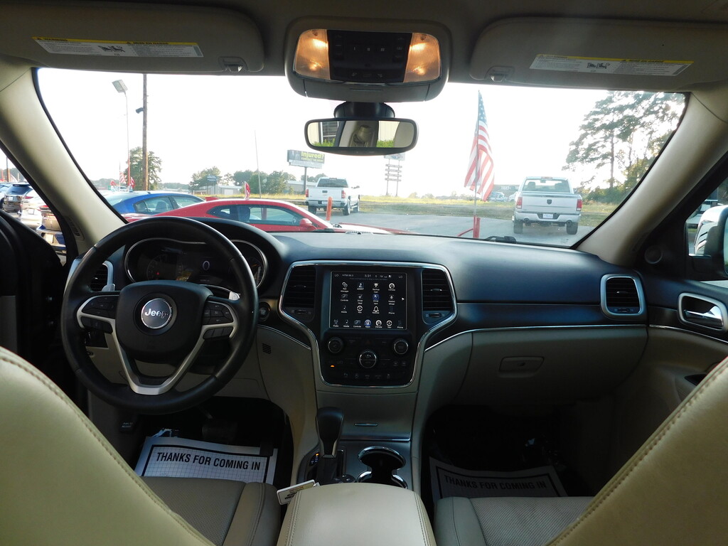 2017 Jeep GRAND CHEROKEE Located at All American Motors light-box-slides