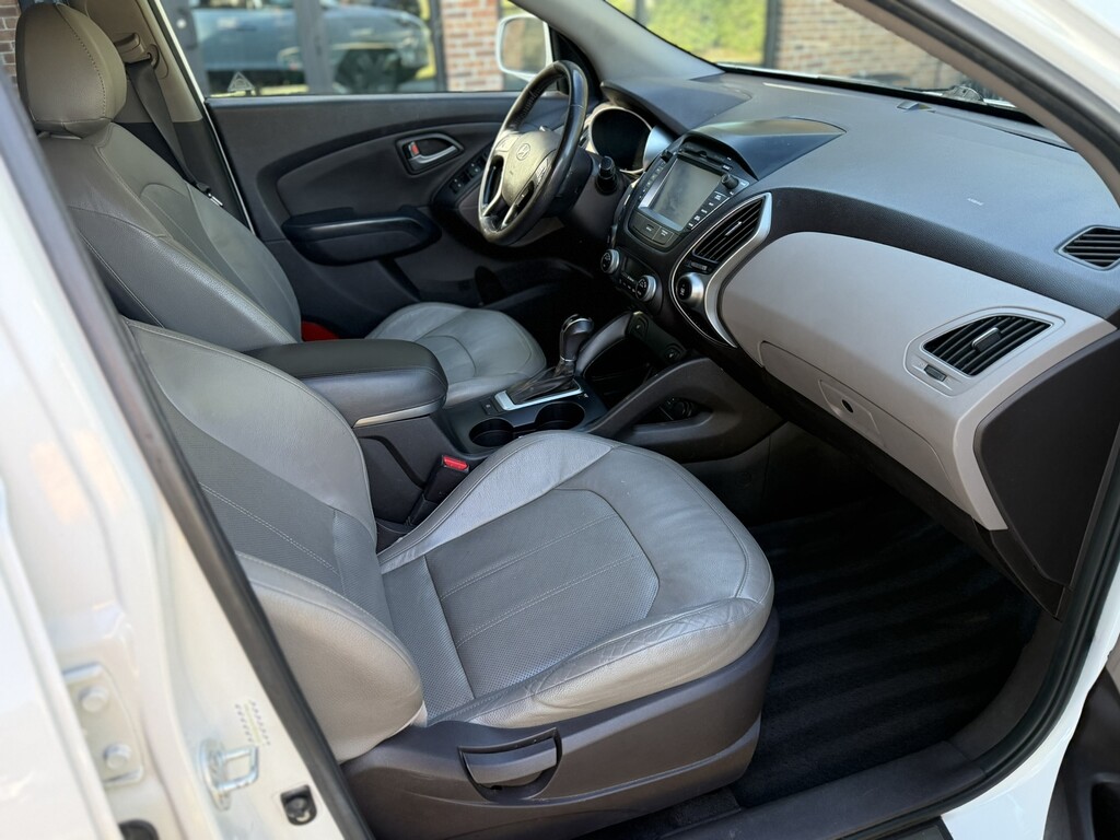 2015 Hyundai Tucson Located at Carsmark Sales slide-image