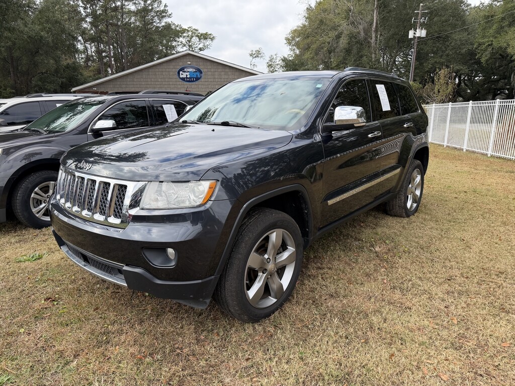 2013 Jeep GRAND CHEROKEE Located at Carsmark Sales light-box-slides