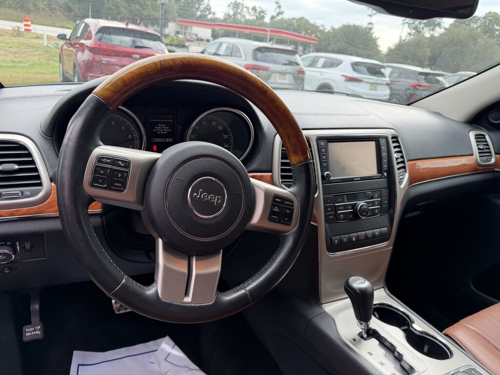 2013 Jeep GRAND CHEROKEE Located at Carsmark Sales light-box-slides