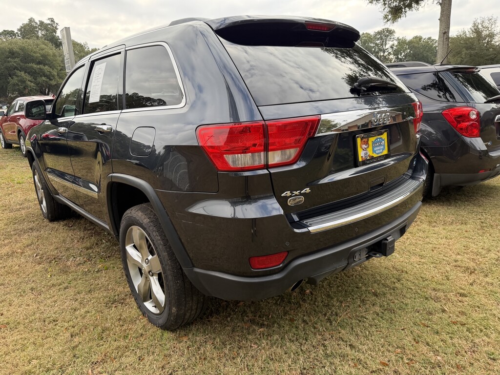 2013 Jeep GRAND CHEROKEE Located at Carsmark Sales light-box-slides