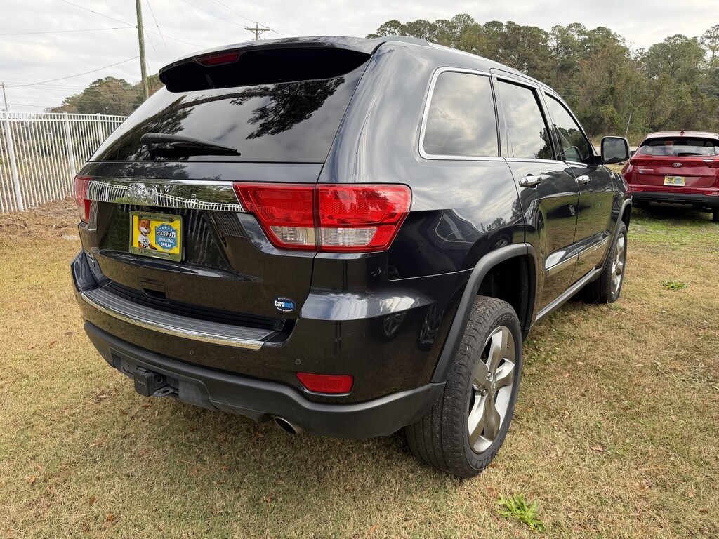2013 Jeep GRAND CHEROKEE Located at Carsmark Sales light-box-slides