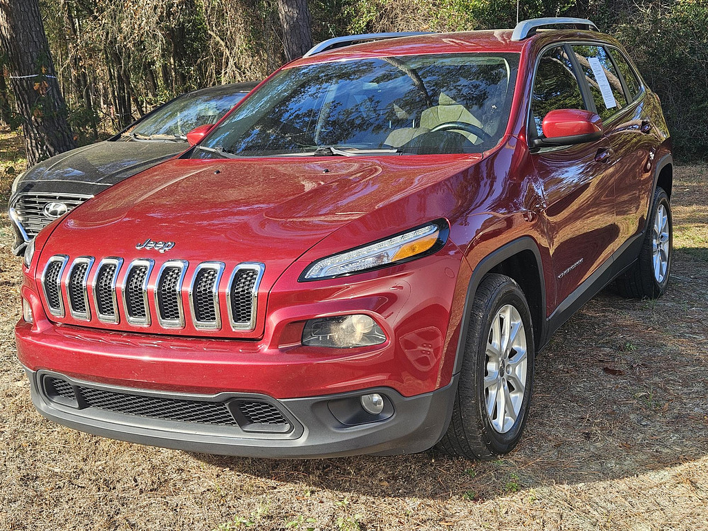 2016 Jeep Cherokee Located at Carsmark Sales light-box-slides