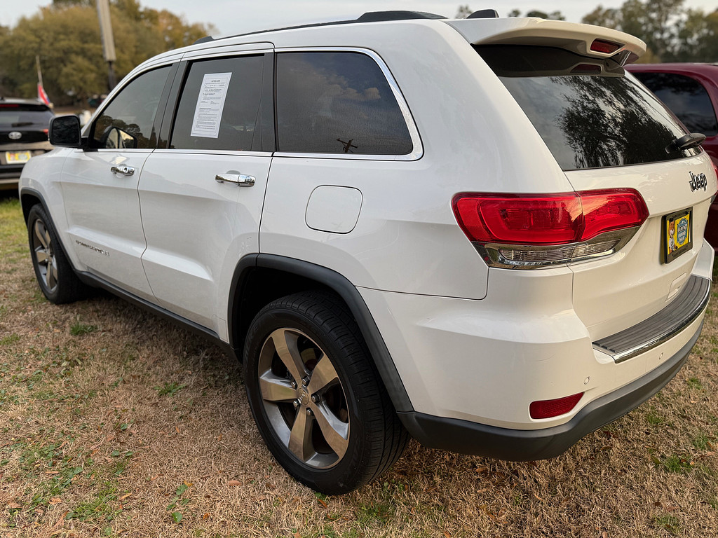2015 Jeep GRAND CHEROKEE Located at Carsmark Sales light-box-slides