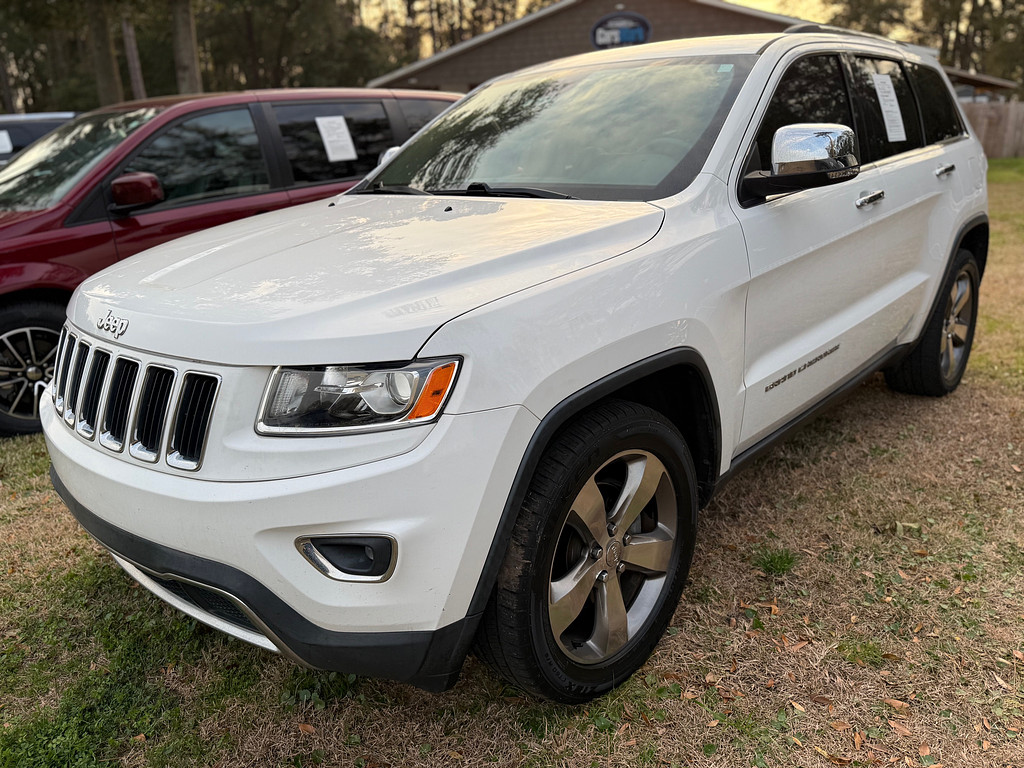 2015 Jeep GRAND CHEROKEE Located at Carsmark Sales light-box-slides