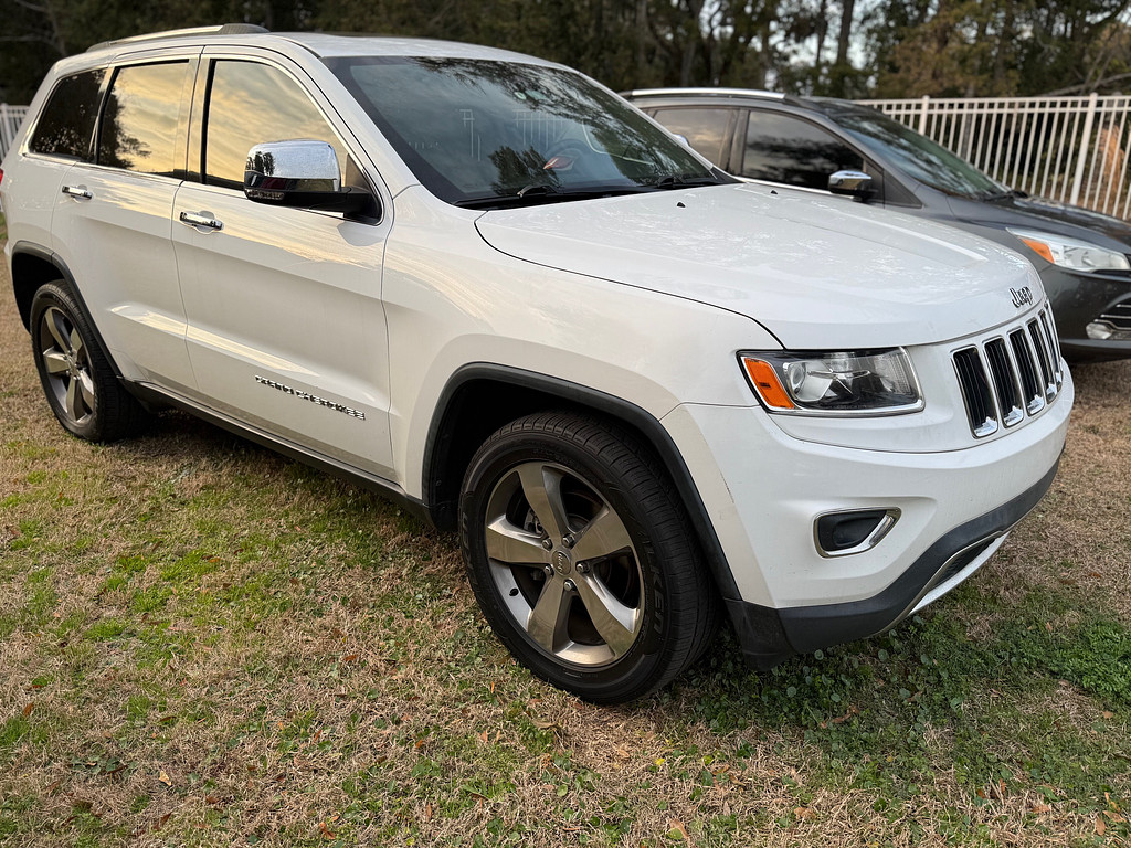 2015 Jeep GRAND CHEROKEE Located at Carsmark Sales light-box-slides