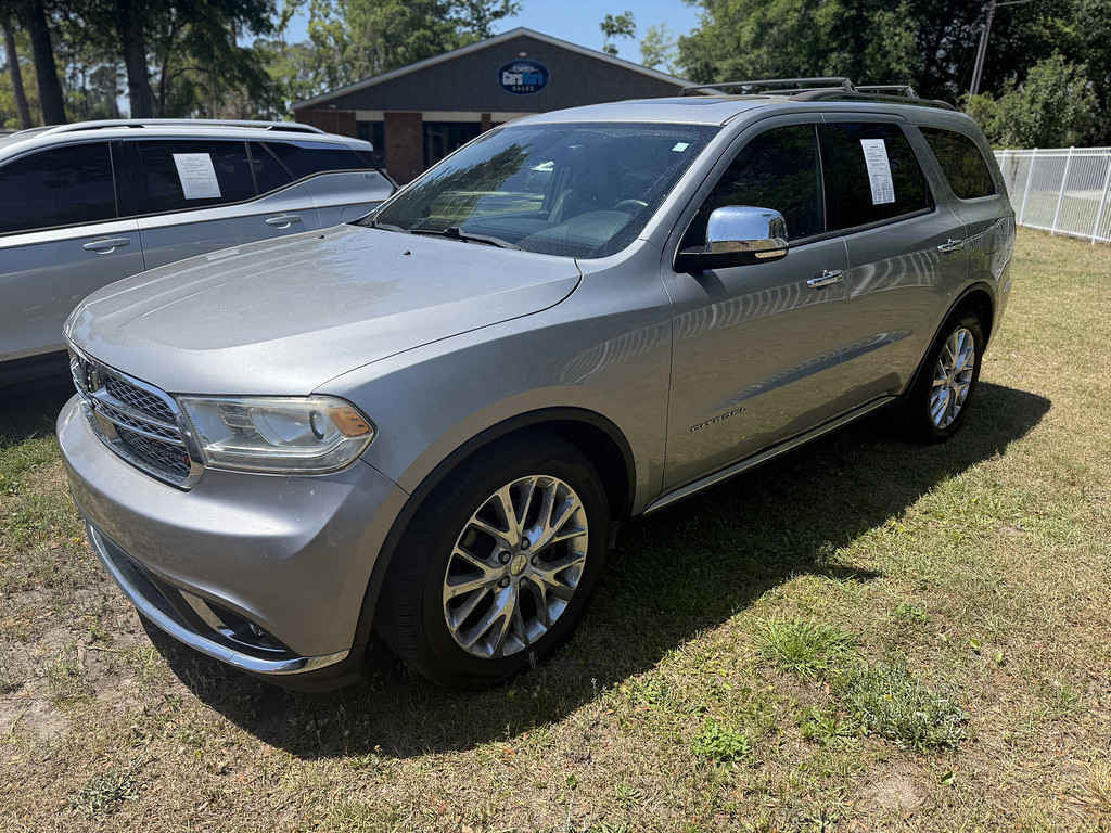 2014 Dodge DURANGO Located at Carsmark Sales light-box-slides