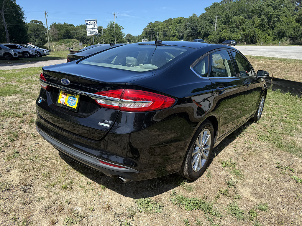 2017 Ford FUSION Located at Carsmark Sales light-box-slides