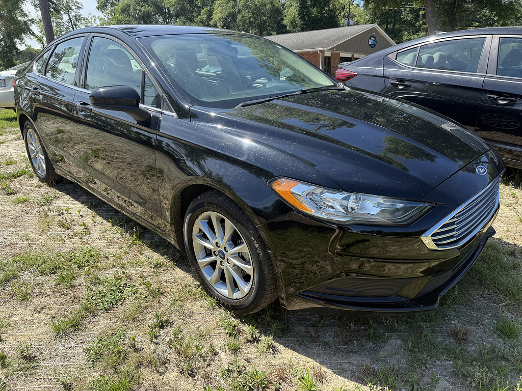 2017 Ford FUSION Located at Carsmark Sales slide-image