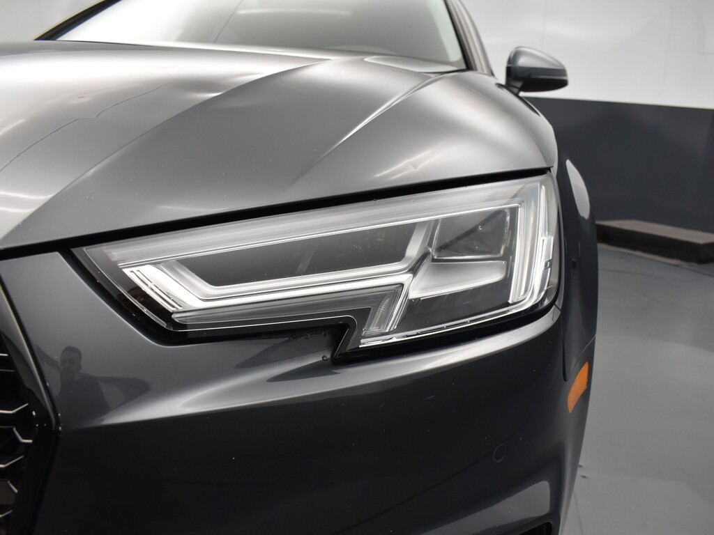 2018 Audi A4 Located at South Shore Mitsubishi light-box-slides