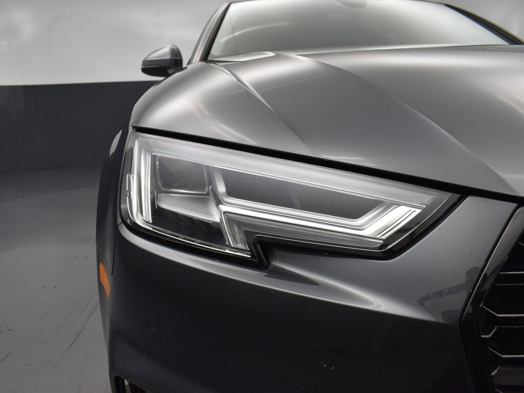 2018 Audi A4 Located at South Shore Mitsubishi light-box-slides
