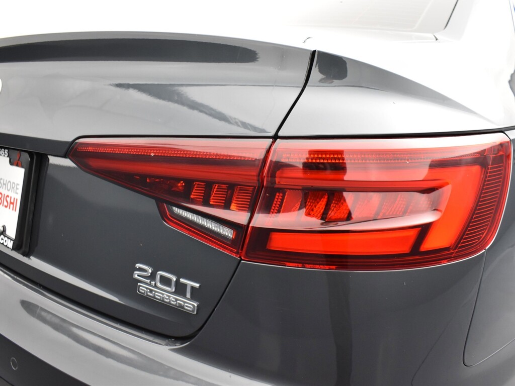 2018 Audi A4 Located at South Shore Mitsubishi light-box-slides