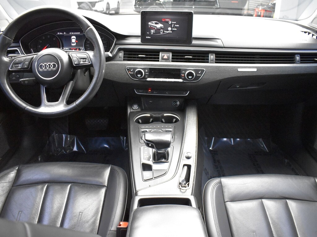 2018 Audi A4 Located at South Shore Mitsubishi light-box-slides